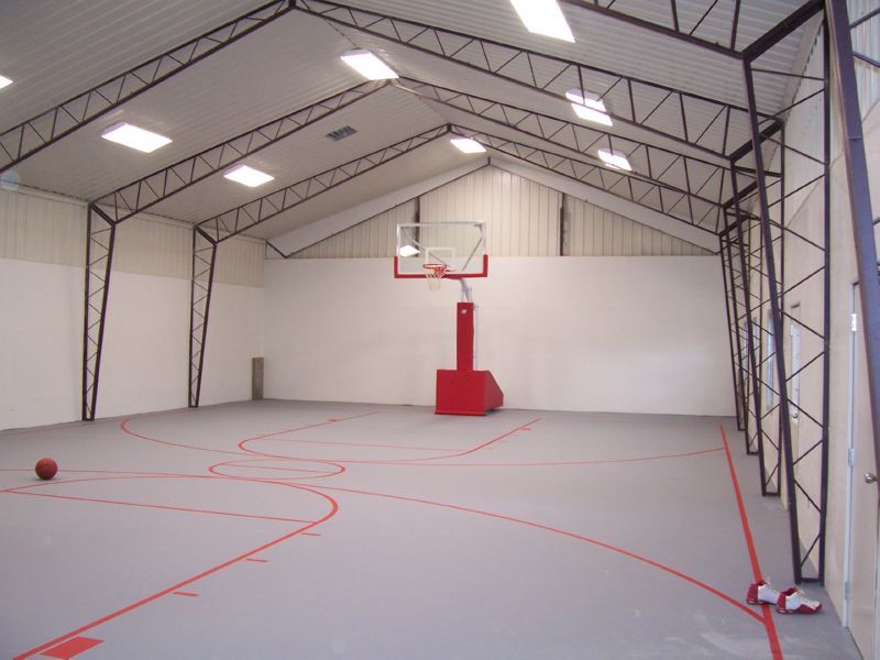 An example of a garage that's been converted into a basketball court