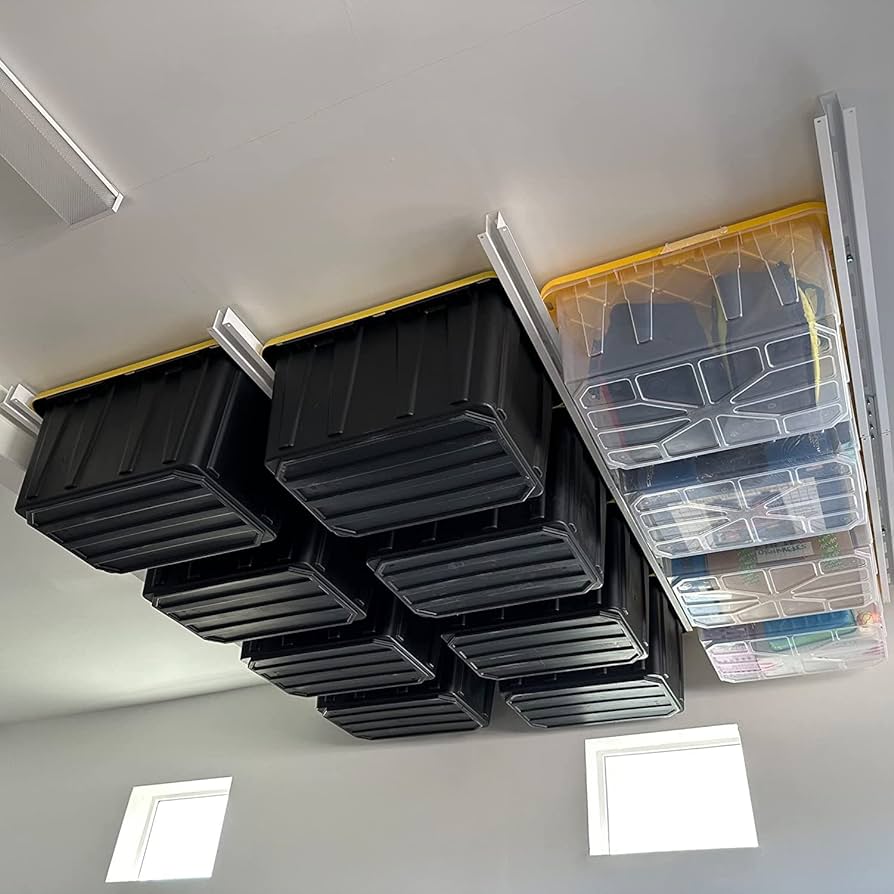 Storage bins on the ceiling of a garage. They're mounted in place. 