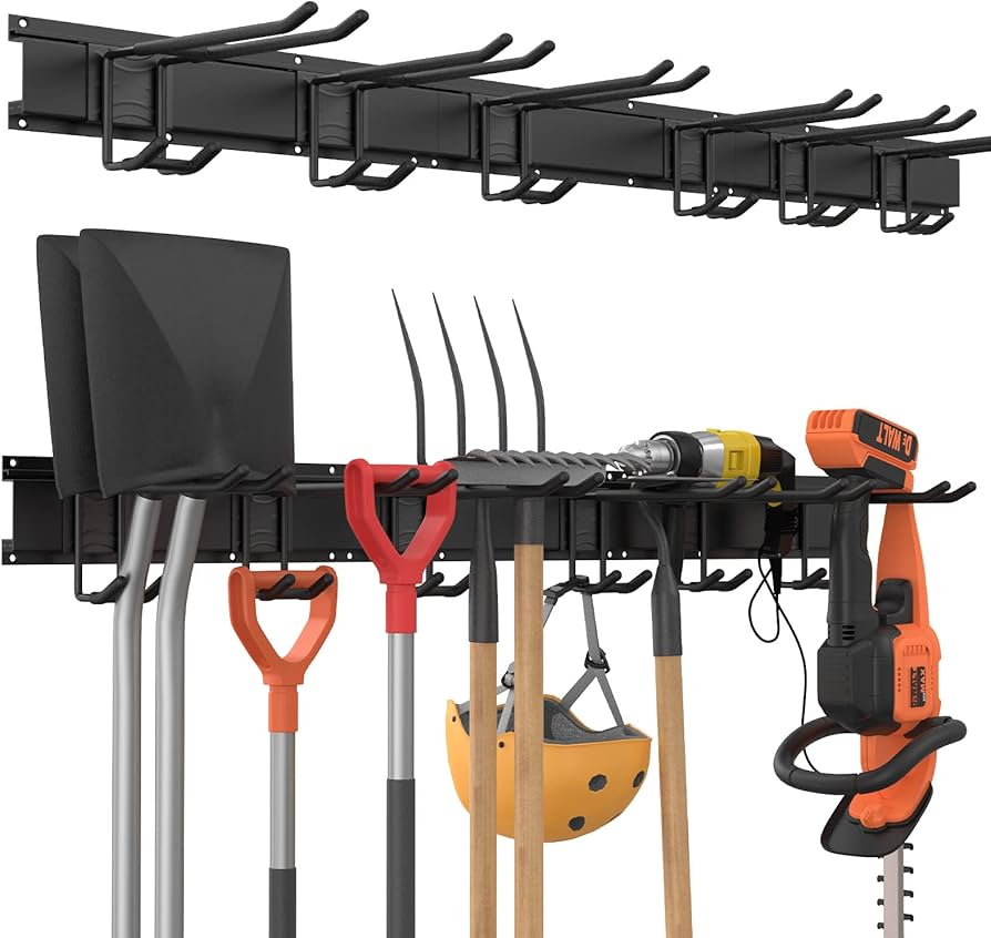 An image of a rack that gets affixed to a garage wall. There are two rack and the bottom rack is holding gardening tools. 